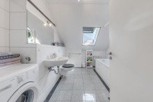 Bad Dachgeschoss-Wohnung Vollvermietetes Wohn- und Geschäftshaus mit Mietsteigerungspotenzial