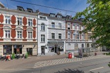 Hauptbild Vollvermietetes Wohn- und Geschäftshaus mit Mietsteigerungspotenzial