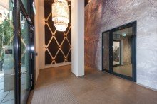 Entrée VERMIETET: Pandion Le Grand: Traumhaft möbliert wohnen mit Concierge, Stellplatz, Gym, Sauna und Weitblick
