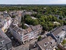 Vogelperspektive Vollvermietetes Wohn- und Geschäftshaus mit Mietsteigerungspotenzial